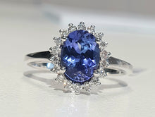 Load image into Gallery viewer, 1.70ct Oval Cut Tanzanite Centre | 0.20cts [18] Round Brilliant Cut Diamonds | Halo Design Ring | 9kt White Gold
