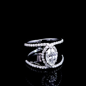 1.075ct Marquise Cut Diamond | 0.60cts [64] Round Brilliant Cut Diamonds | Designer Swirl Ring | 18kt White Gold