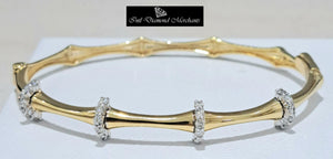 0.70cts [24] Round Brilliant Cut Diamonds | Designer Clip Bangle | 18kt Yellow Gold