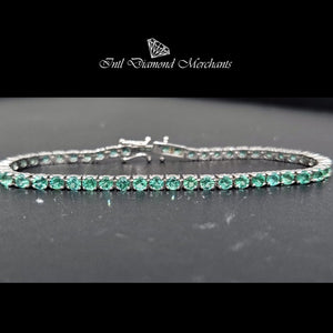 5.20cts [49] Round Cut Green Emeralds | Tennis Bracelet | 18kt White Gold