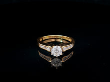 Load image into Gallery viewer, 0.60ct Round Brilliant Cut Diamond | 0.10cts [8] Round and Baguette Cut Diamonds | Designer Ring | 18kt Yellow Gold
