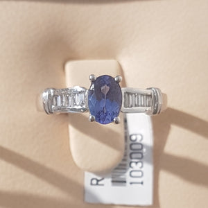 0.71ct Oval Cut Tanzanite | 0.20cts Emerald Cut Diamonds | Designer Ring | 18kt White Gold