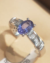 Load image into Gallery viewer, 0.71ct Oval Cut Tanzanite | 0.20cts Emerald Cut Diamonds | Designer Ring | 18kt White Gold
