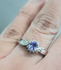 0.30ct Oval Cut Tanzanite | 0.14ct Round Brilliant Cut Diamonds | Dress Ring | 18kt White Gold