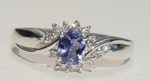 0.30ct Oval Cut Tanzanite | 0.14ct Round Brilliant Cut Diamonds | Dress Ring | 18kt White Gold