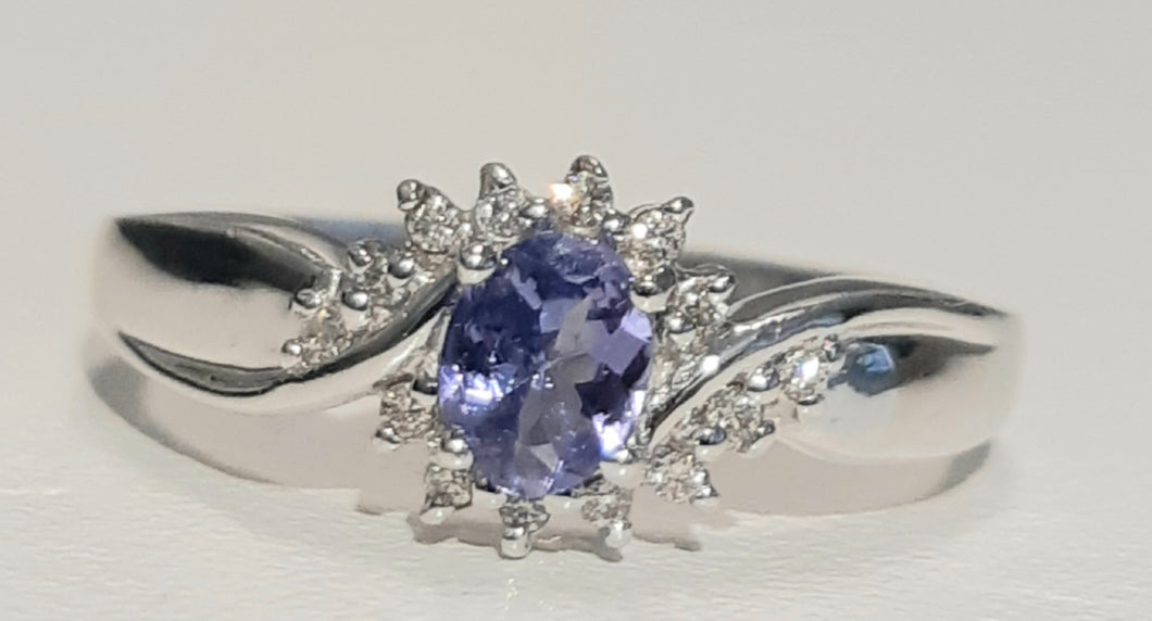0.30ct Oval Cut Tanzanite | 0.14ct Round Brilliant Cut Diamonds | Dress Ring | 18kt White Gold