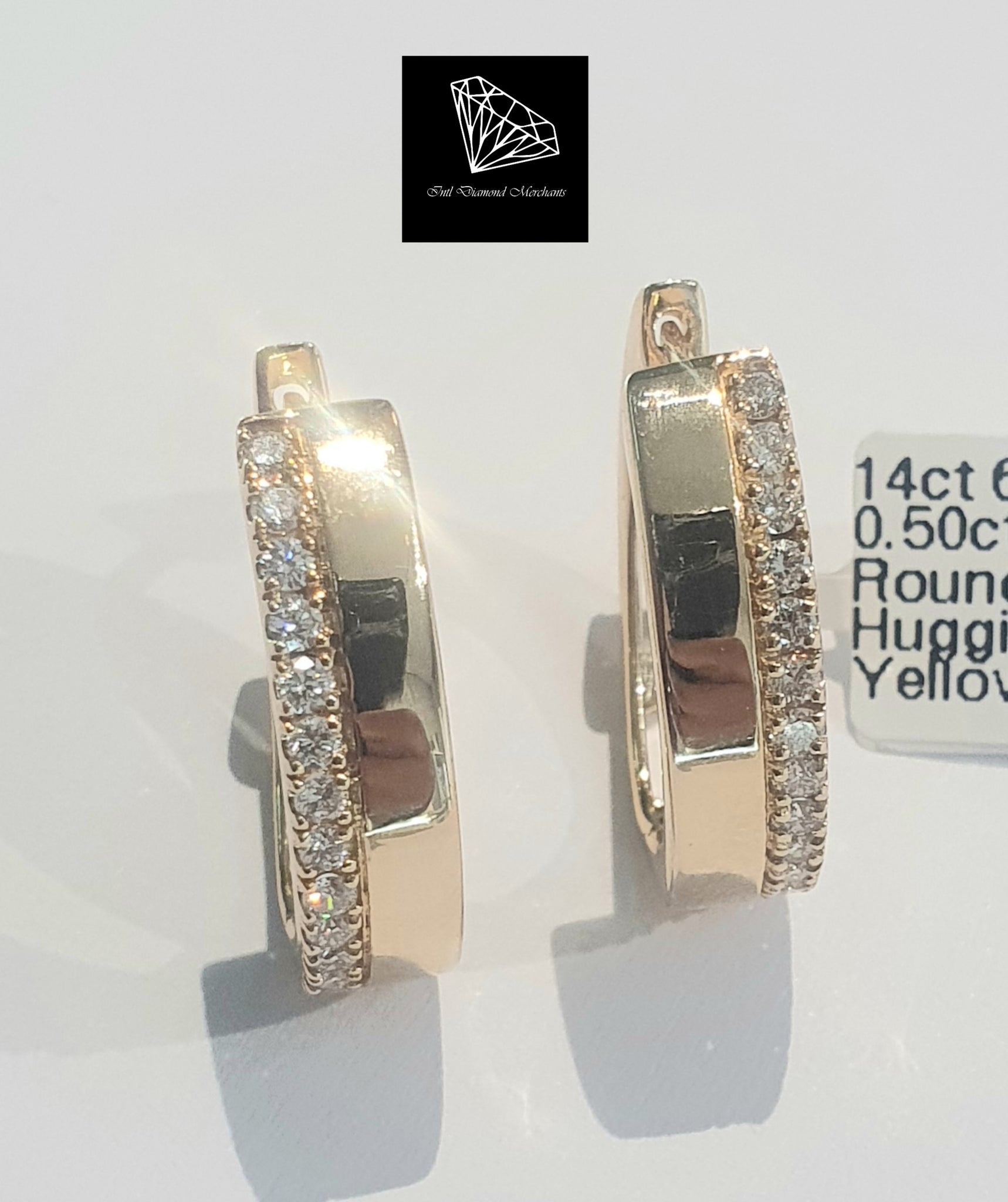 Designer discount huggie earrings