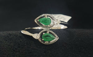 0.45cts [2] Pear Cut Emeralds | 0.10cts [2] Pear Cut Diamonds | Designer Open Shank Ring | 18kt White Gold