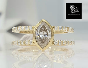 0.725ct Marquise Cut Diamond | 0.33cts [36] Round Brilliant Cut Diamonds | Split Shank Design Ring | 18kt Yellow Gold