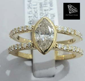 0.725ct Marquise Cut Diamond | 0.33cts [36] Round Brilliant Cut Diamonds | Split Shank Design Ring | 18kt Yellow Gold