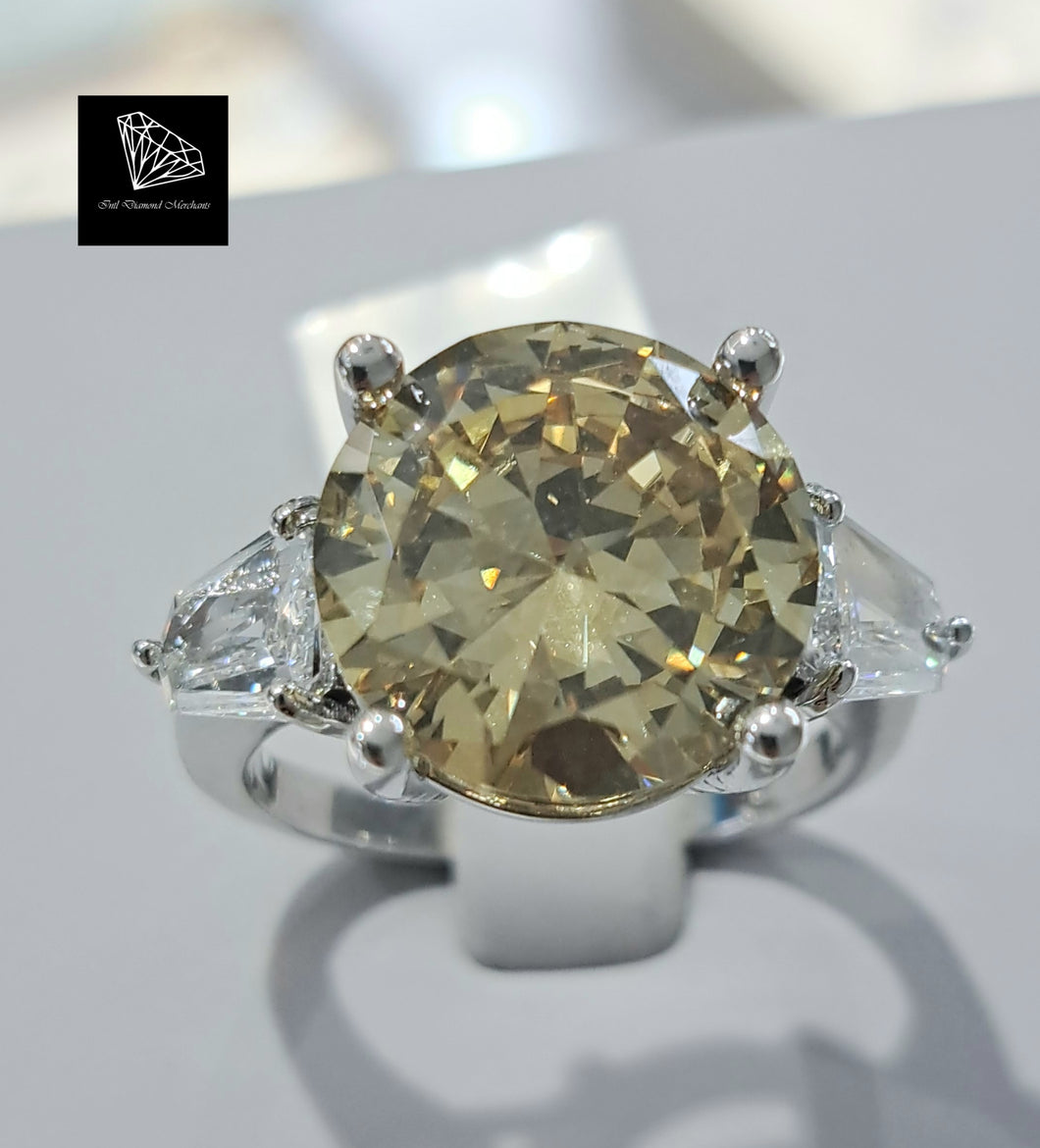 5.7470ct Round Brilliant Cut Certified Centre Diamond | 0.76cts [2] Bullet Cut Diamonds | Designer Trilogy Ring | 18kt White Gold