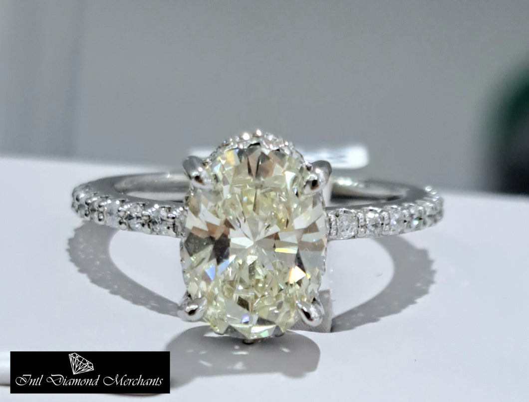 1.895ct Oval Cut Certified Diamond Centre | 0.540cts [36] Round Brilliant Cut Diamonds | Designer Underhalo Ring | 18kt White Gold
