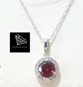 0.50ct Round Cut Garnet | 0.10cts Round Brilliant Cut Diamonds | Halo Pendant with Chain | 14kt White Gold
